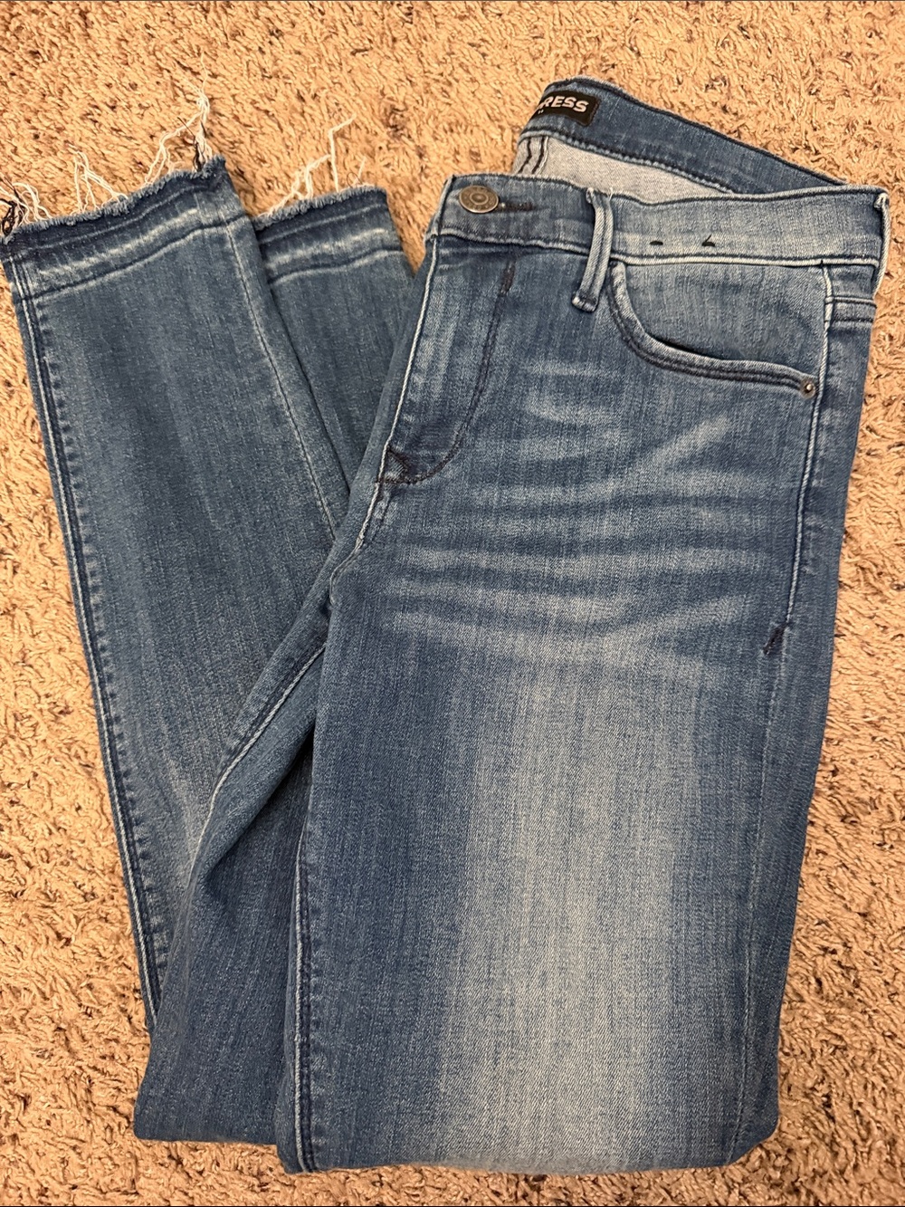 Express Women’s Lighter Blue Skinny Jeans with Frayed raw Hem mid rise ankle leg